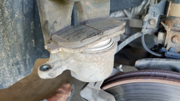 030-caliper-piston-with-old-brake-pad