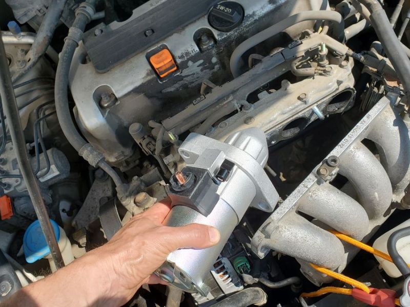 Install the new starter into a Honda Accord